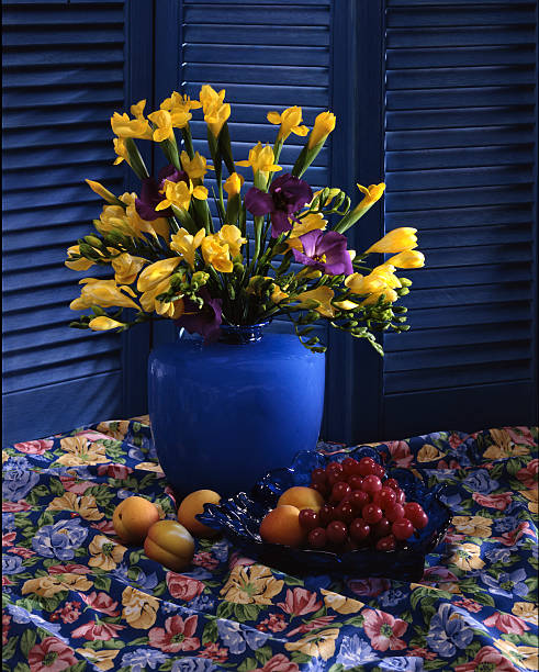 Flowers still life, chocolate box yellow, blue,