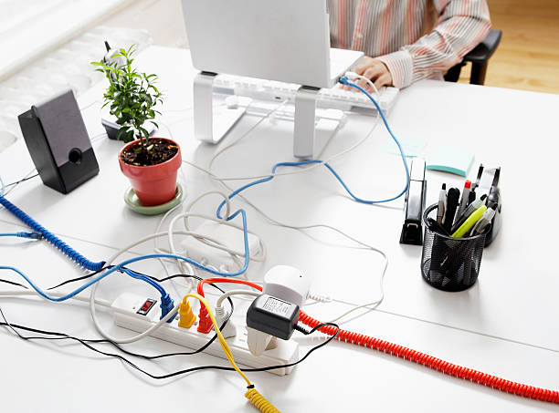 Computer Cables on Extension Cord stock photo