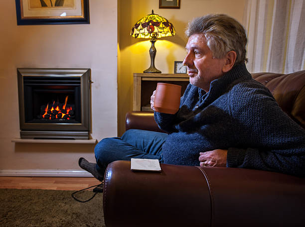 istock Mature man at home on sofa 467040504