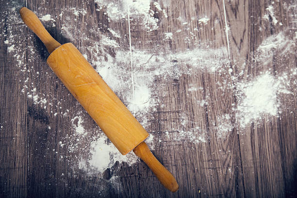 istock Rolling pin with flour on wooden table 467040822
