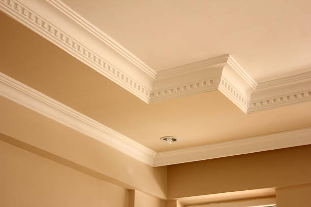 Elegant ceiling with tan and cream paint colors stock photo