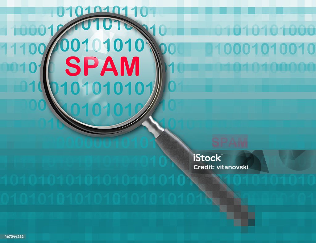 spam Close up of magnifying glass on spam 2015 Stock Photo