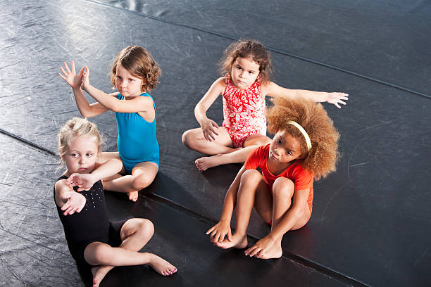 istock Little girls wearing leotards 467044779