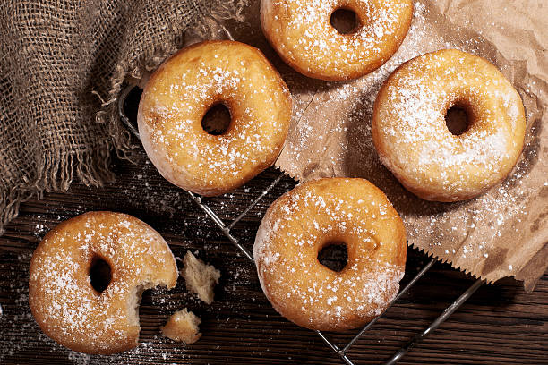 istock Homemade donuts on a wooden table 467047198