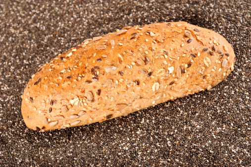 Kornspitz  bread on seed background