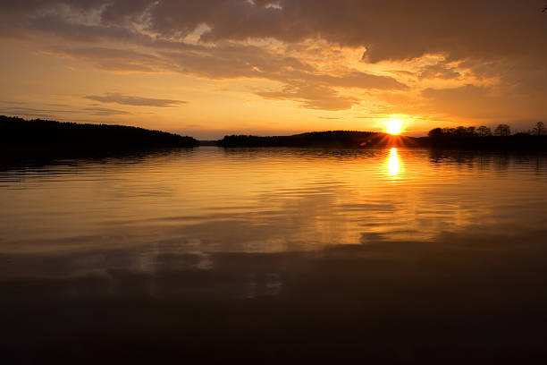 istock Lake at sunset with beautiful reflections 467049962