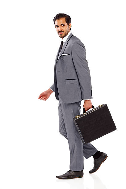 istock Happy young businessman with briefcase going to office 467052139