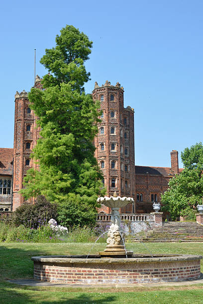istock elizabethan tower with fountain in foreground 467053045