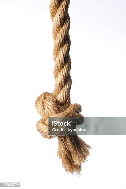 Knot On Brown Rope End Against White Background Stock Photo