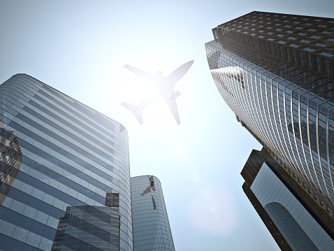 3d image of airplane and tall skyscraper