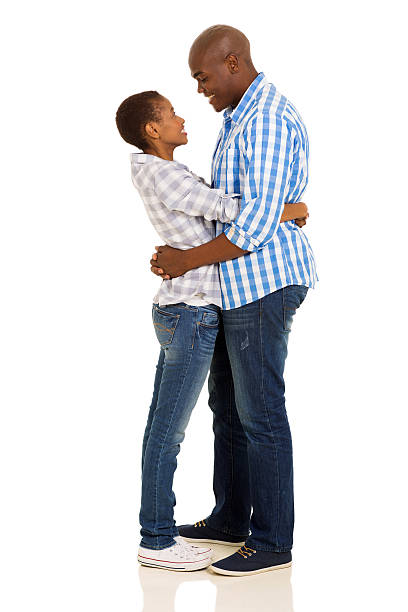 istock afro american couple hugging 467054456