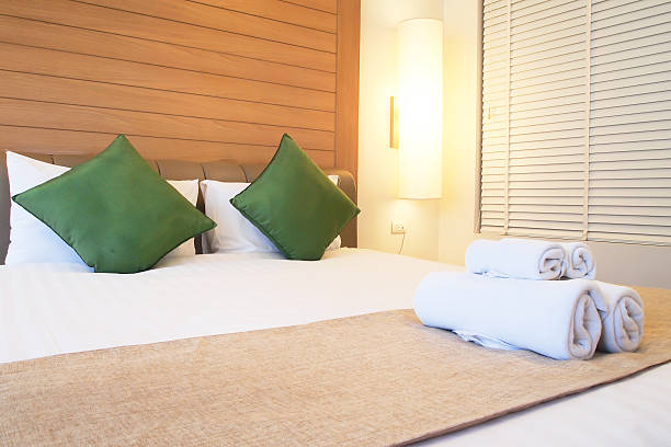 istock Closed up bed in luxury hotel room 467054844