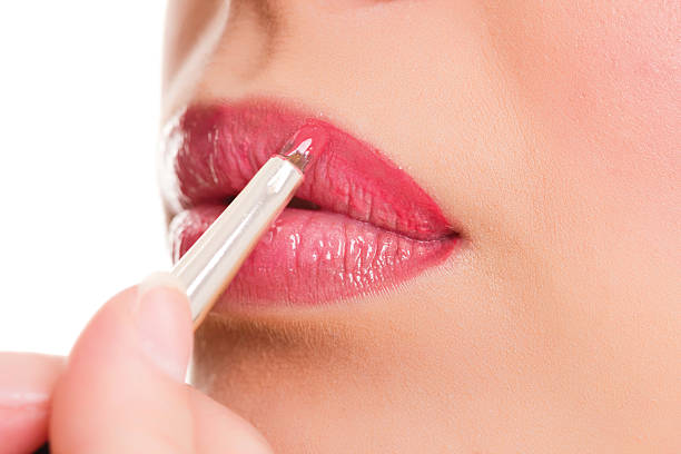 istock woman professional make-up, lipgloss 467056827