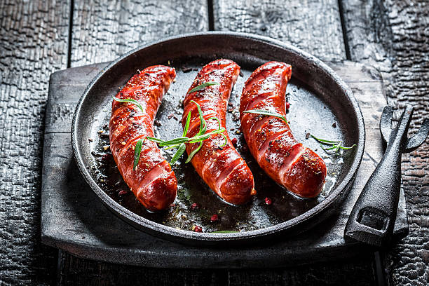 istock Grilled sausage with fresh rosemary 467057200