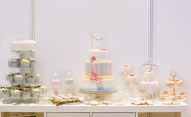 istock Elegant sweet table with big cake, cupcakes 467057291