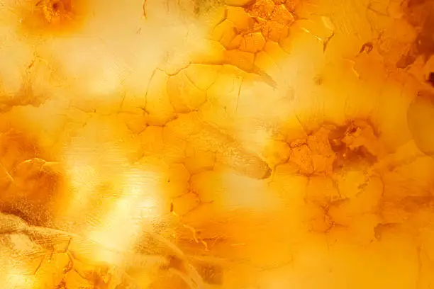 Photo of amber background or texture