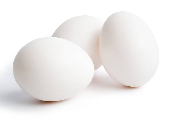 uovo isolato su sfondo bianco - protein colors macro horizontal foto e immagini stock