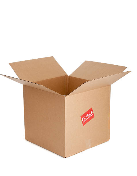 istock Cardboard box with fragile sticker on white 467063367