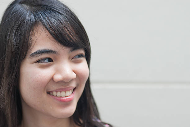 istock cheerful woman thinking and looking up with high aspirations 467063993