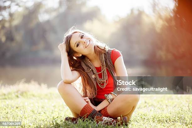 Girl On Grass Stock Photo - Download Image Now - Adult, Back Lit, Beautiful People