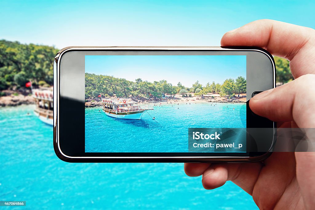 Smart phone photo at paradise island Smart phone mobile photo at paradise tropical island Backgrounds Stock Photo