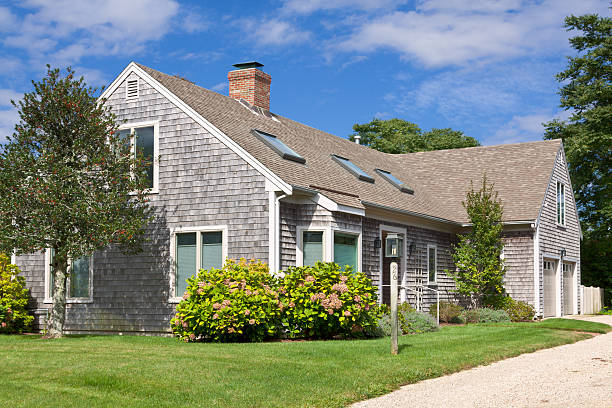 Luxury New England House, Chatham, Cape Cod, Massachusetts. Blue sky. Chatham, MA, USA - September 15, 2014: Luxury New England Home in Chatham, Cape Cod, Massachusetts, USA. Canon EF 24-105mm f/4L IS lens. skylight stock pictures, royalty-free photos & images