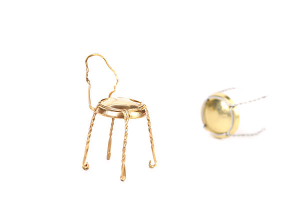 istock Golden muzzle and chair made out of it. 467071283