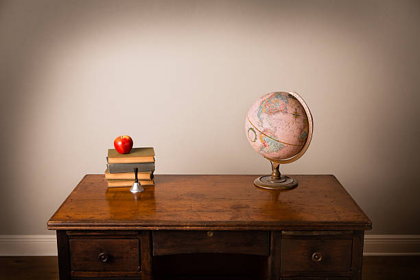 istock Vintage Books and Globe Sitting on Desk, With Copy Space 467073857