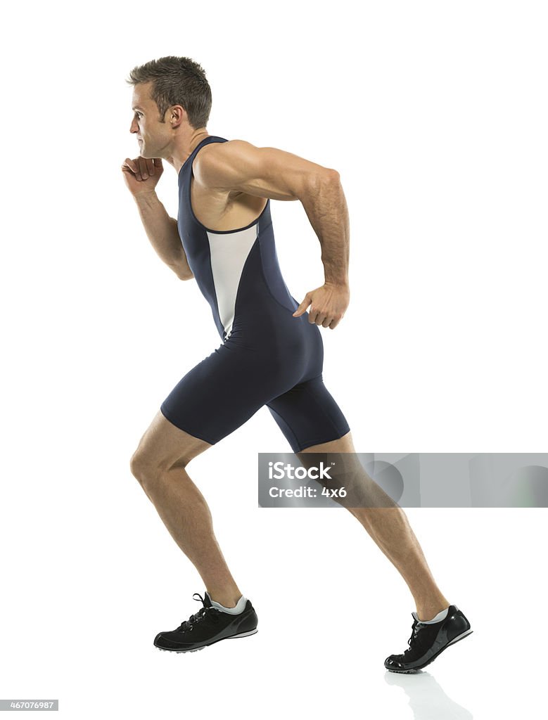 Profil mężczyzna sportowiec biegania - Zbiór zdjęć royalty-free (Białe tło)