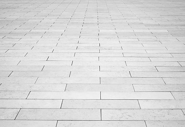 istock Grey brick stone street road. Light sidewalk, pavement texture 467076998