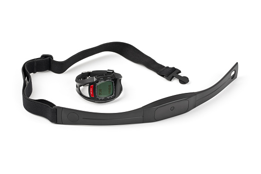 Fitness tracker watch with a heart rate monitor chest strap. Isolated on white.