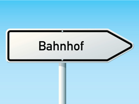 Vector Illustration of a typical german directional Road Sign in front of a clear blue sky: Bahnhof (Train Station), arrow sign to the right. All objects are on separate layers. The colors in the .eps-file are ready for print (CMYK). Transparencies used. Included files: EPS (v10) and Hi-Res JPG.