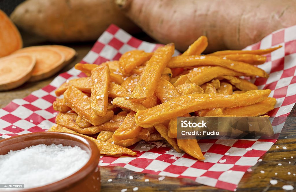 Sweet Potato Fries A serving of delicious deep fried sweet potato fries. Baked Stock Photo