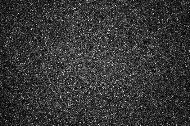 Close up of black shiny asphalt