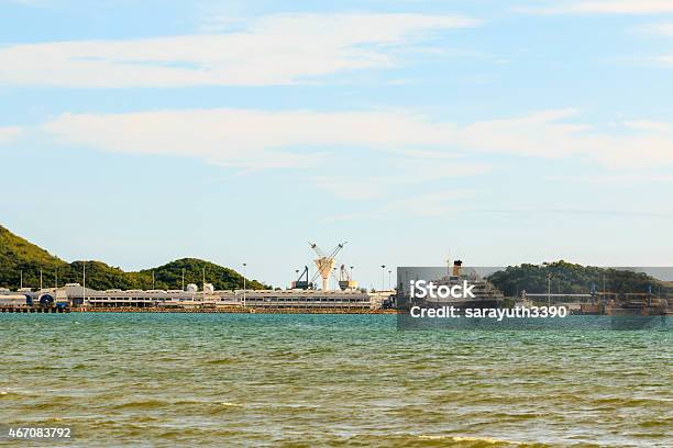 Big Ship Yard And Sea Under Cloudy Sky In Day Stock Photo - Download Image Now - 2015, Anchored, Boat Deck