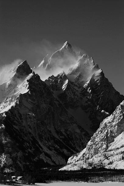 istock Grand Tetons looking like the Alps snow blowing off peak 467084116