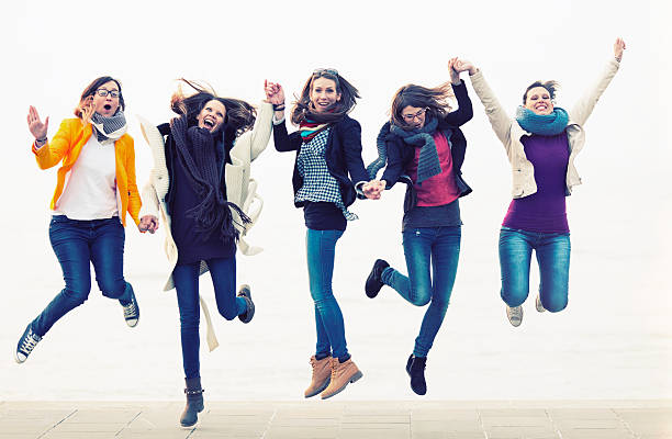 istock Group of friends jumping 467084618