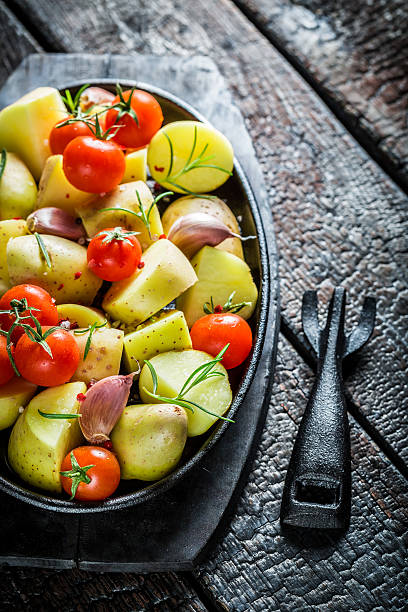 istock Vegetables with rosemary and garlic on barbecue dish 467085000