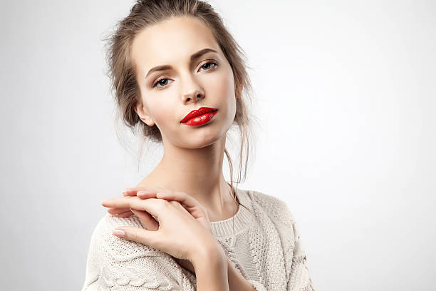 istock Pretty young woman with red lips 467085792
