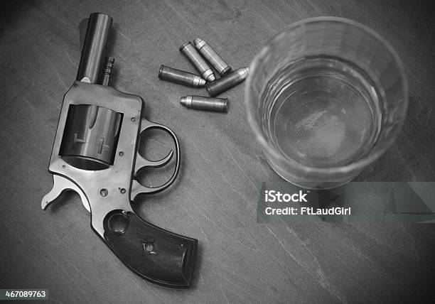 Vintage Pistol Or Gun With Booze And Bullets Stock Photo - Download Image Now - Gun, Old, Whiskey