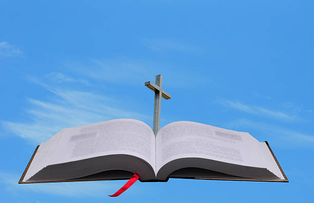 istock bible, cross and heaven conept 467089805
