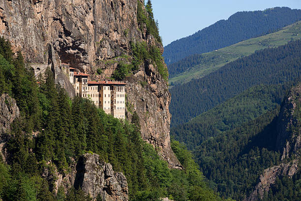 Sumela Monastery, Turkey The Sumela Monastery (Built in the 4th century) is a Greek Orthodox monastery in the region of Maçka, Trabzon, Turkey. Nestled in a steep cliff at an altitude of about 1,200 metres (3,900 ft) facing the Altındere valley. sumela monastery stock pictures, royalty-free photos & images