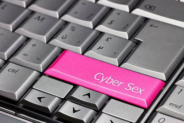 klawisz na klawiaturze różowy-cyber płeć - cyberseks zdjęcia i obrazy z banku zdjęć