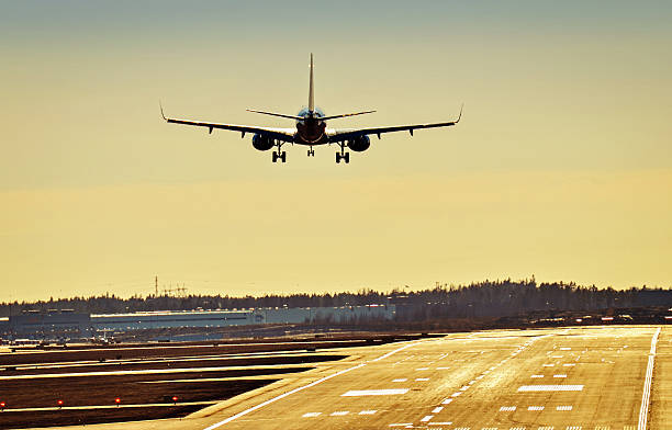 istock Airplane landing to runway 467094240
