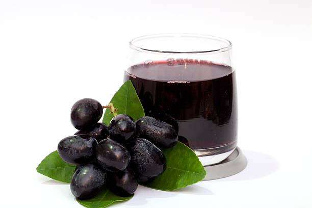 Grape and juice isolated stock photo