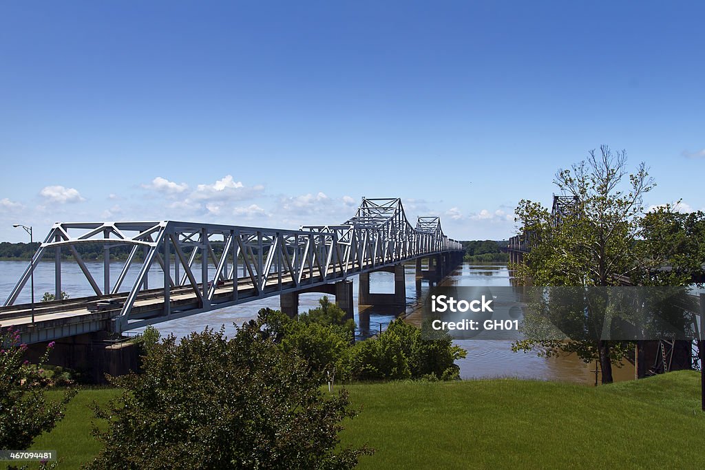 Bridge over the Mississippi River Cantilevered truss bridges (freeway and railway)crossing over the Mississippi River from Mississippi to Louisiana. Mississippi River Stock Photo