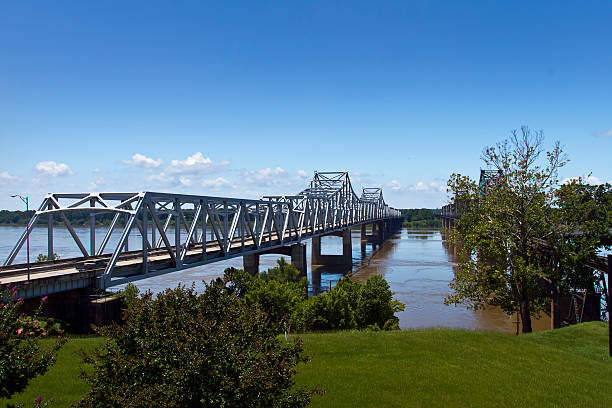 Bridge over the Mississippi River Cantilevered truss bridges (freeway and railway)crossing over the Mississippi River from Mississippi to Louisiana. vicksburg stock pictures, royalty-free photos & images