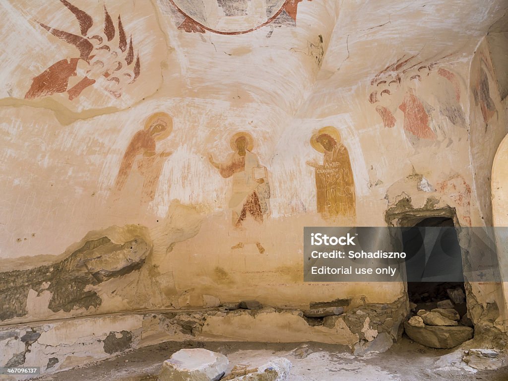 David Gareja monastery. Kakheti, Georgia - November 07, 2013: Old murals on the walls of one of the caves in David Gareja Monastery complex in Kakheti region, Georgia, Caucasus. Altar Stock Photo