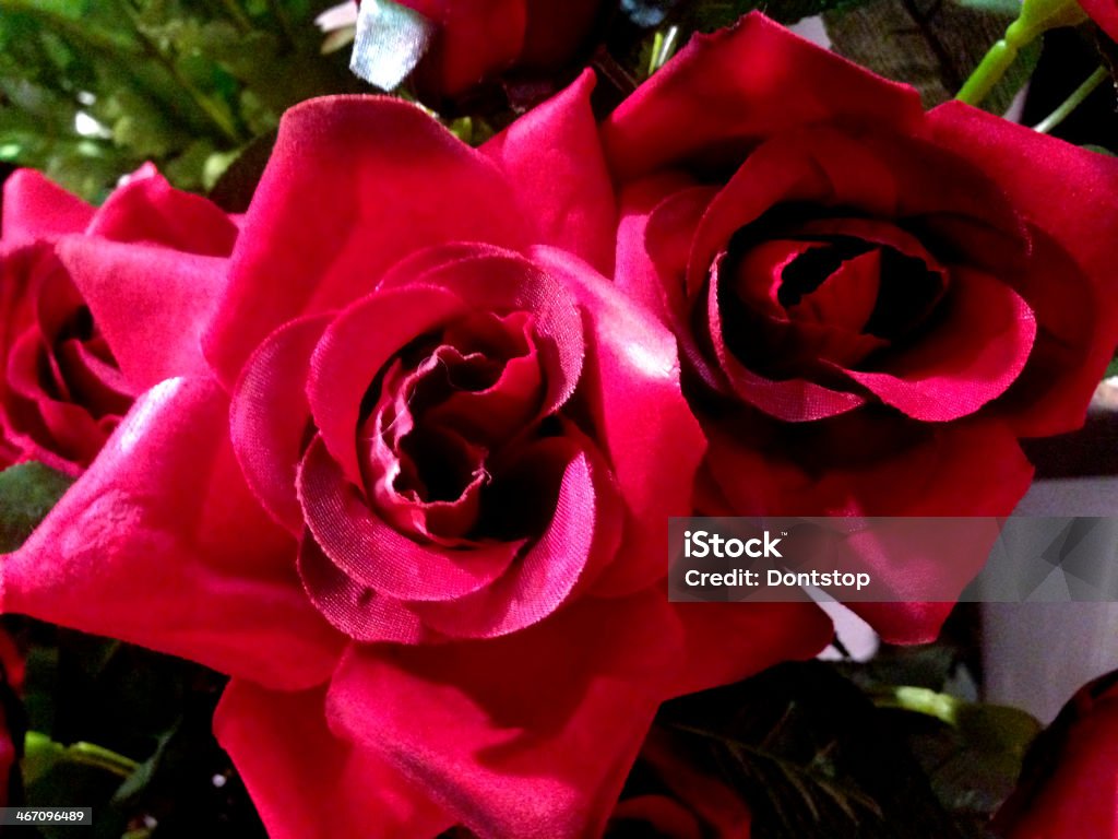 Fake flowers Closeup of a brides red rose bridal bouquet Color Image Stock Photo