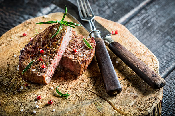 istock Roasted steak with fresh rosemary 467101288